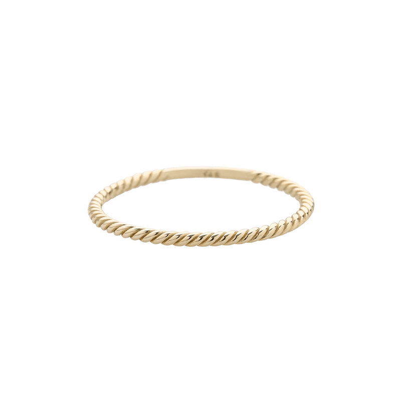 twist staking ring made from solid 14k gold