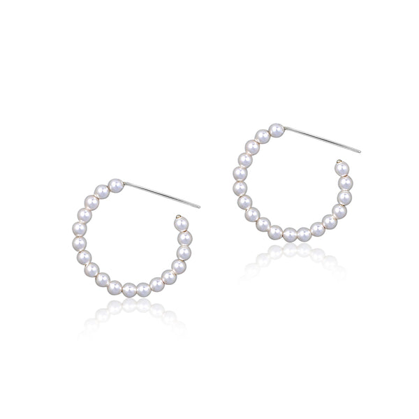 pearl hoop earrings made from sterling silver
