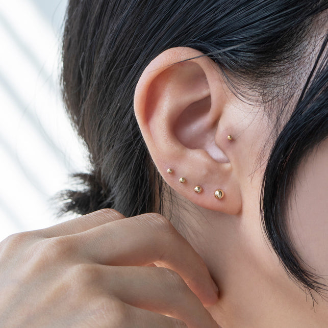ear stack featuring ball stud flat back ear piercings