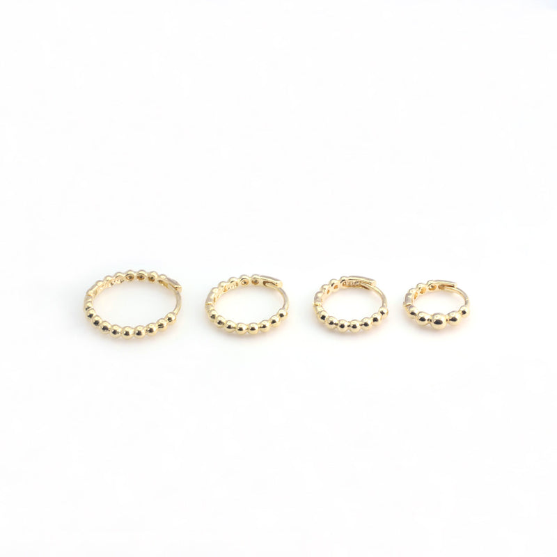 14k gold stacked beaded hoop earrings in 6m, 8mm, 9mm and 11mm