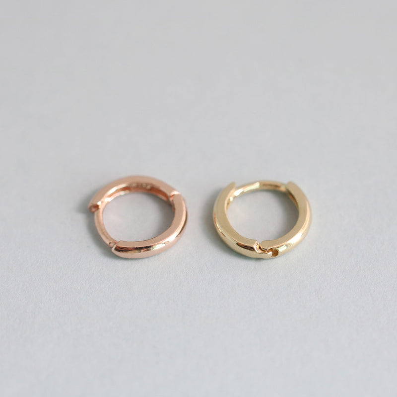14k gold small huggie hoop earrings in yellow and rose gold