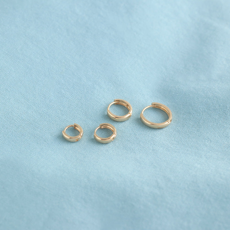 bold huggie hoop earrings in 5mm, 6mm, 7mm and 9mm