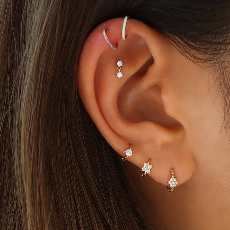 clover huggie hoop earring in upper lobe piercing