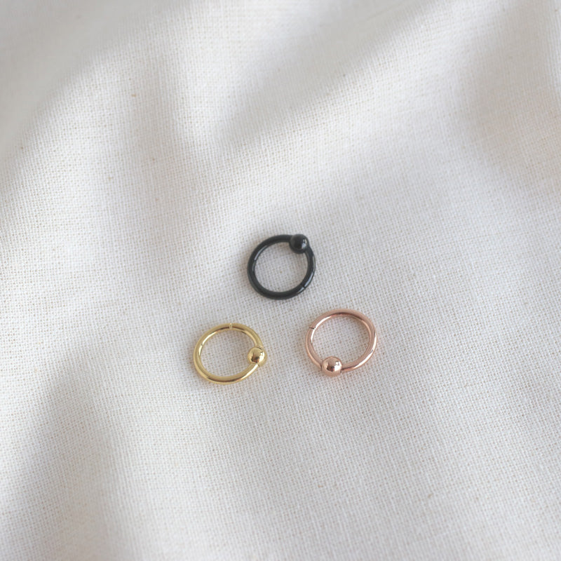 stainless steel hinged captive bead rings in gold, black and rose gold