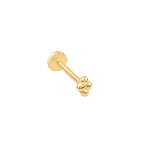 Quad bead cluster labret piercing in 14k gold