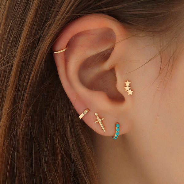 tiny flat huggie hoop earring in third lobe piercing