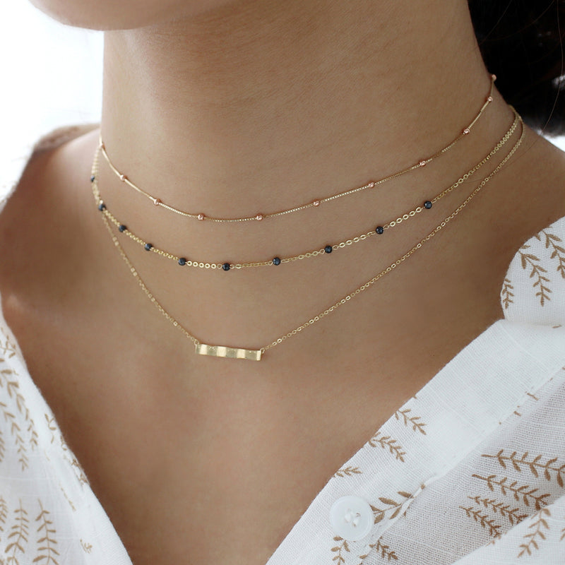 layered gold choker necklaces