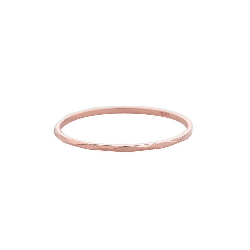 skinny faceted ring made from 14k rose gold