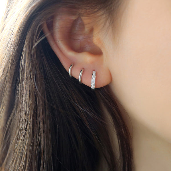 slim huggie hoop earrings made from sterling silver