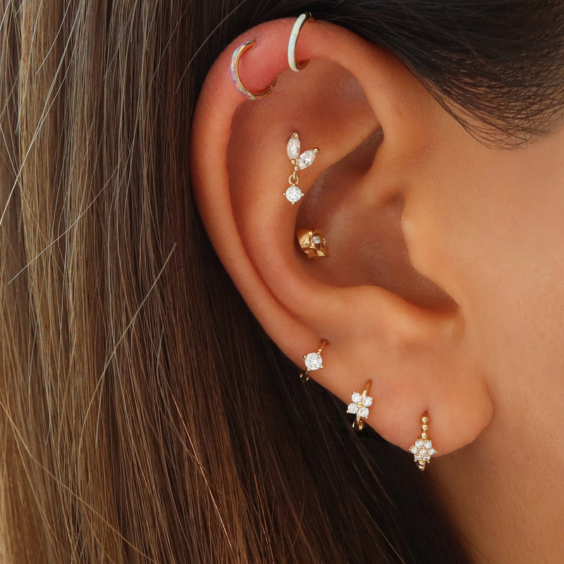 clover huggie hoop earring in second lobe piercing