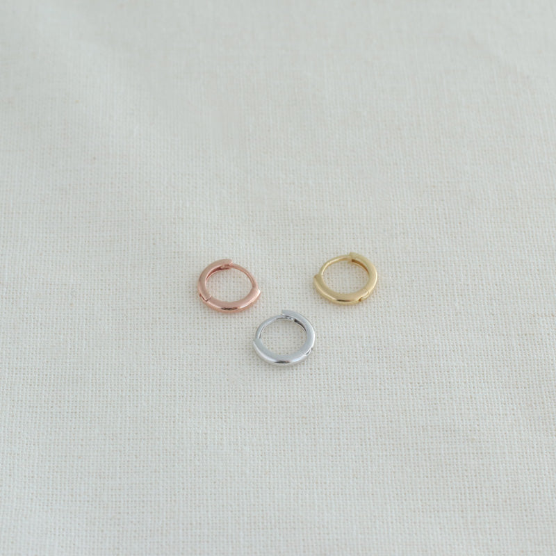 tiny huggie hoop earrings in silver, gold and rose gold