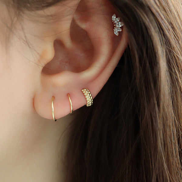 seamless huggie hoop earring in 10k gold